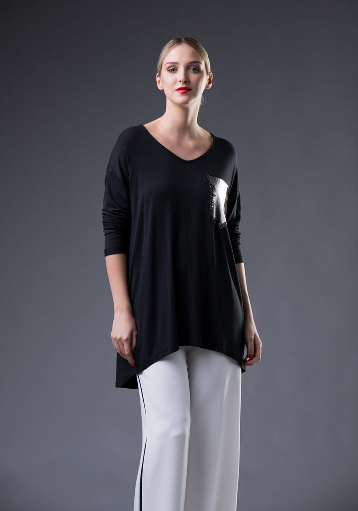 LOOK 10 POUNDS SLIMMER: 10 TRICKS FROM THE FASHION EXPERTS